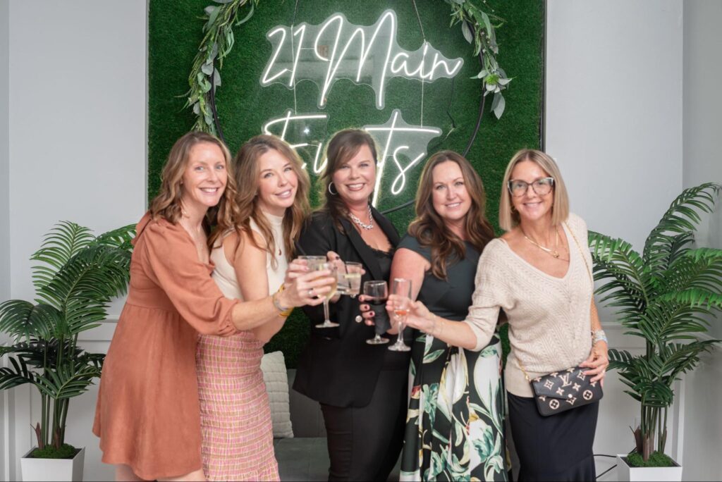 image of ladies doing a toast