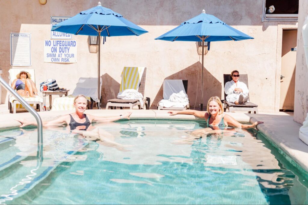 image of people relaxing in the pool