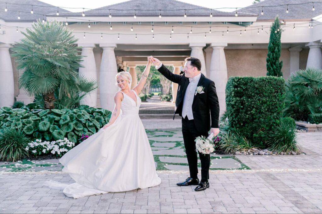 image of newly wed couple dancing