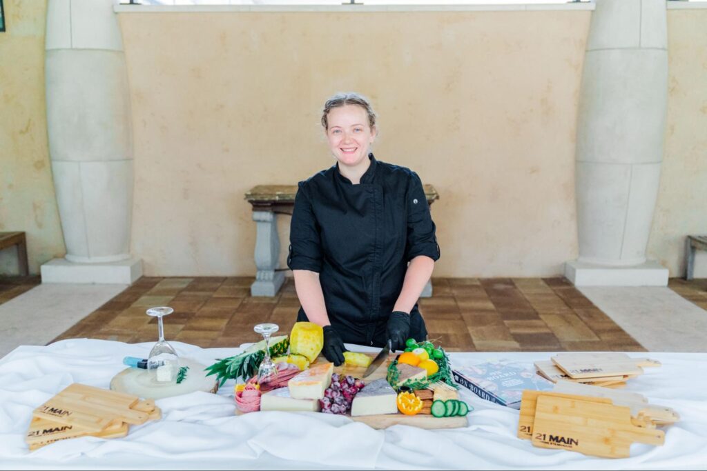 image of a lady preparing charcuterie