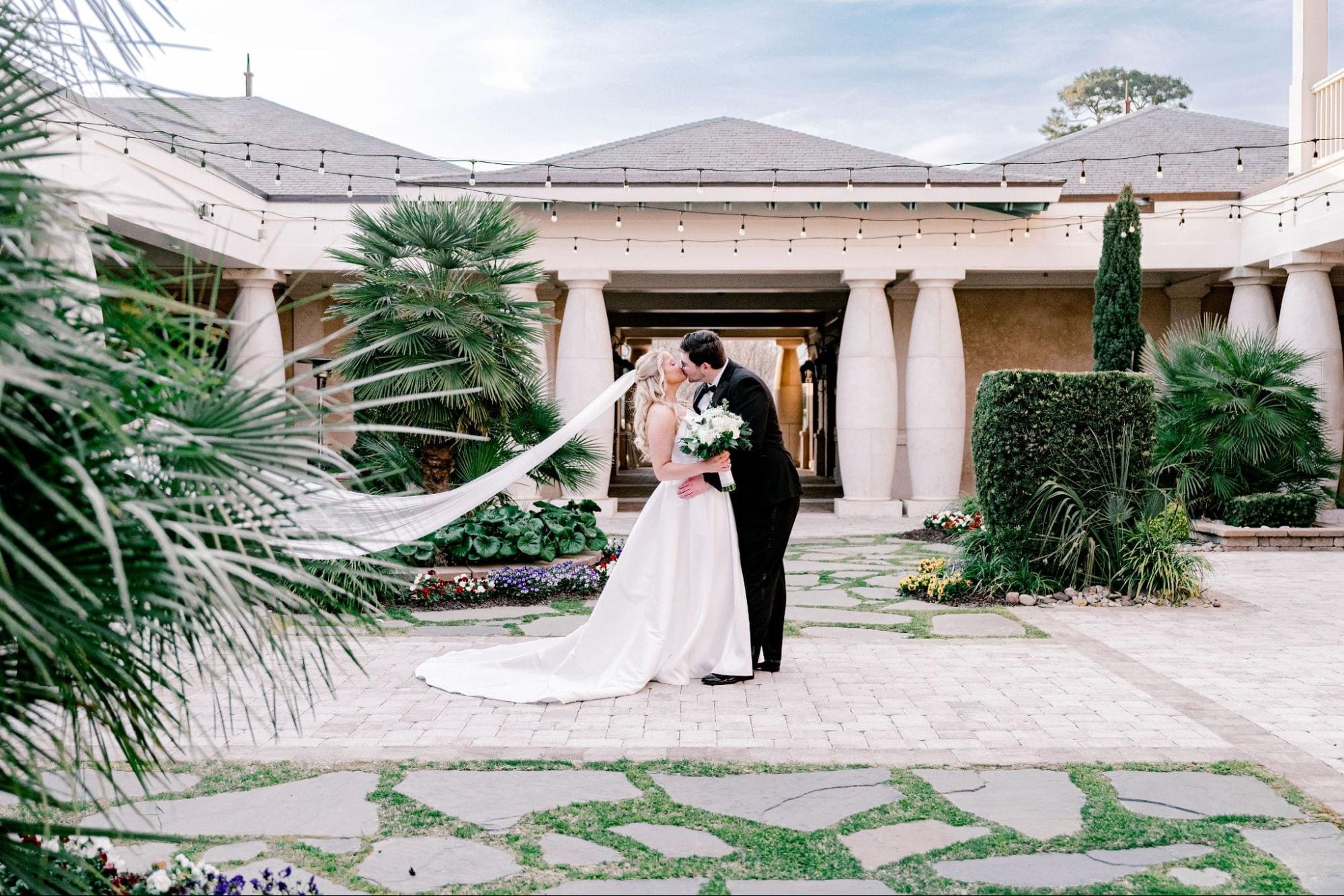 Bride and groom celebrating their wedding reception in the elegant ballroom at 21 Main Events in North Myrtle Beach.