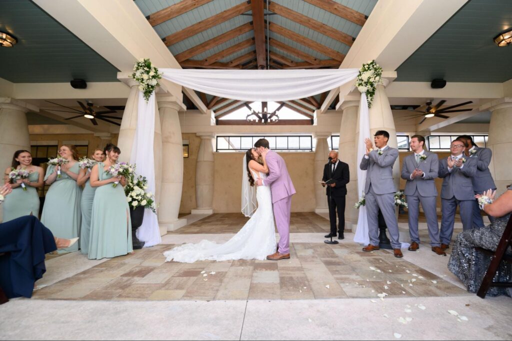 Elegant summer beach wedding ceremony setup at 21 Main Events